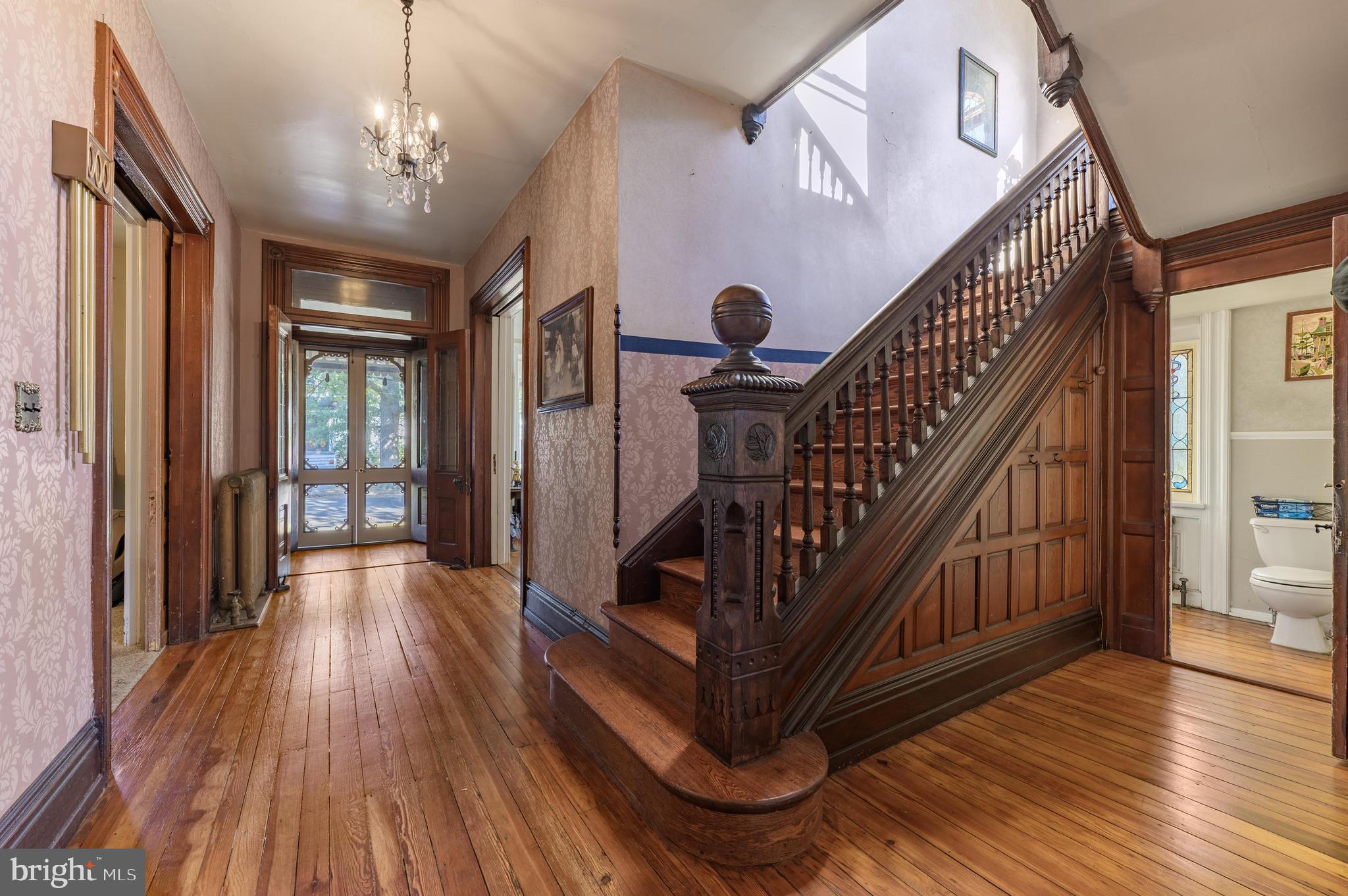 48 Broad Street Mount Holly, NJ 08060 - Photo 9 of 63 a view of entryway with wooden floor and stairs