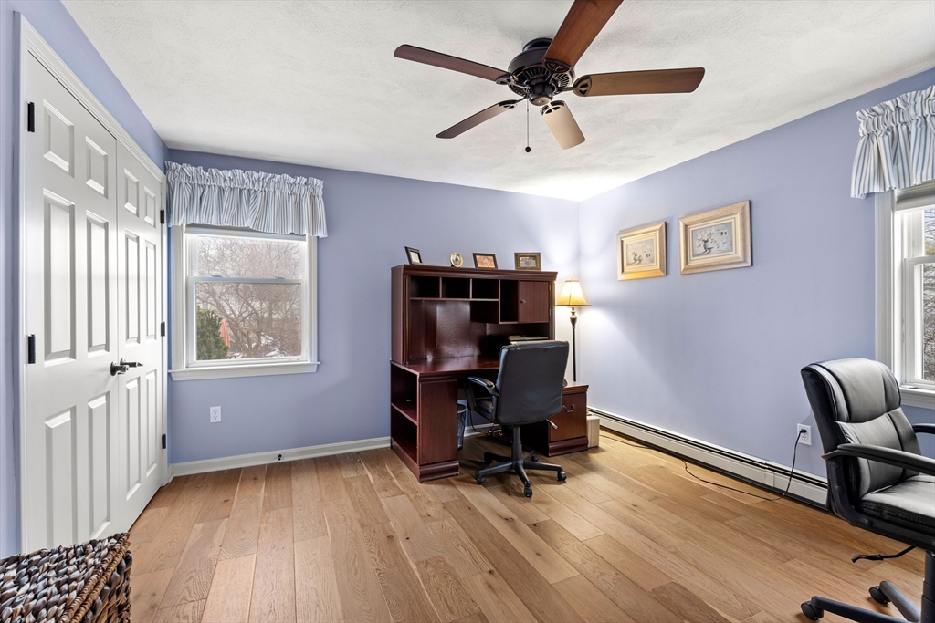 27 Folger Avenue Beverly, MA 01915 - Photo 24 of 34 a view of a workspace with furniture and a window