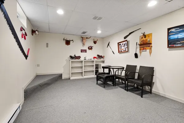 a view of a workspace with furniture