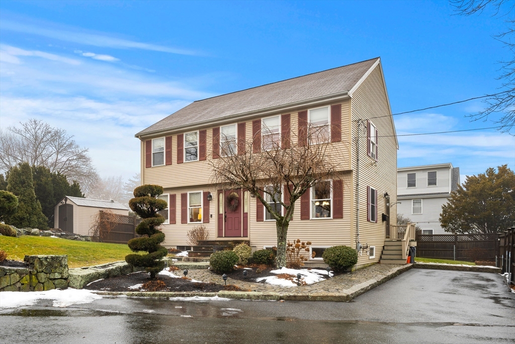 27 Folger Avenue Beverly, MA 01915 - Photo 3 of 34 a front view of a house with a yard