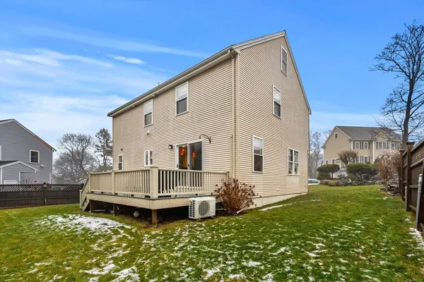 a backyard of a house with yard and outdoor seating