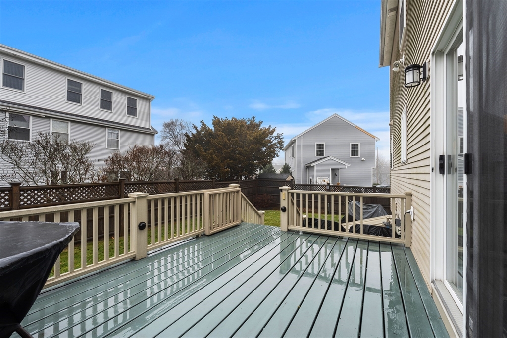 27 Folger Avenue Beverly, MA 01915 - Photo 33 of 34 a view of a wooden chairs on the deck