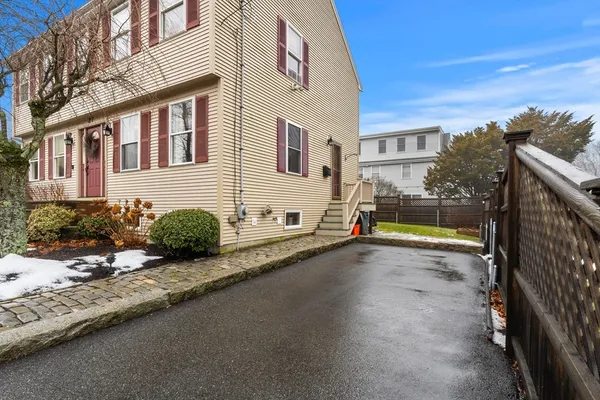 a view of backyard of a house