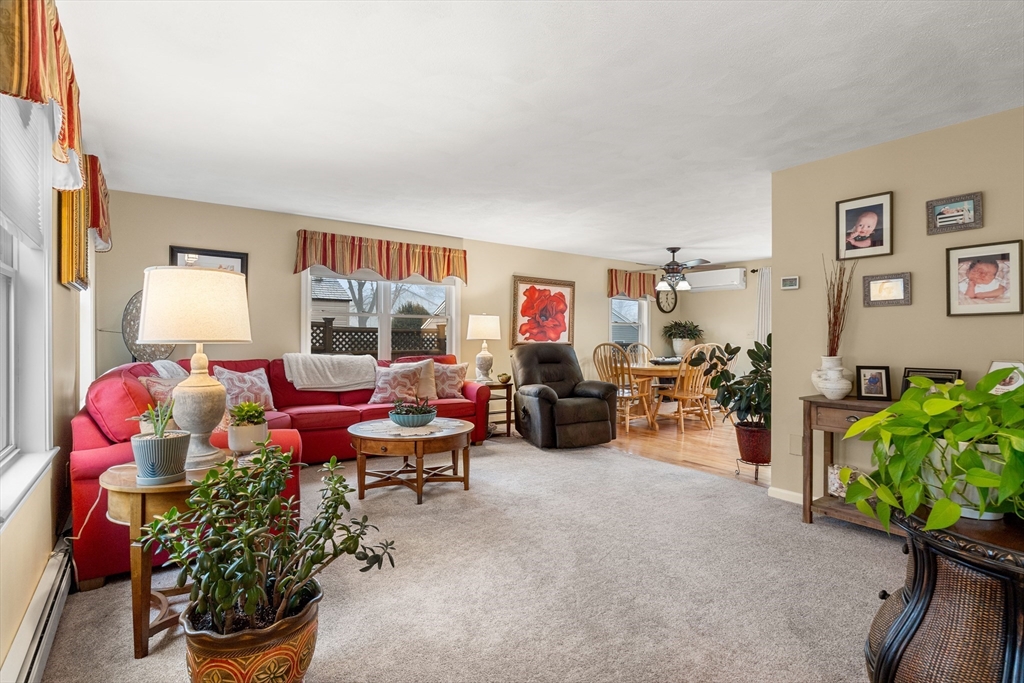 27 Folger Avenue Beverly, MA 01915 - Photo 10 of 34 a living room with furniture and a flat screen tv