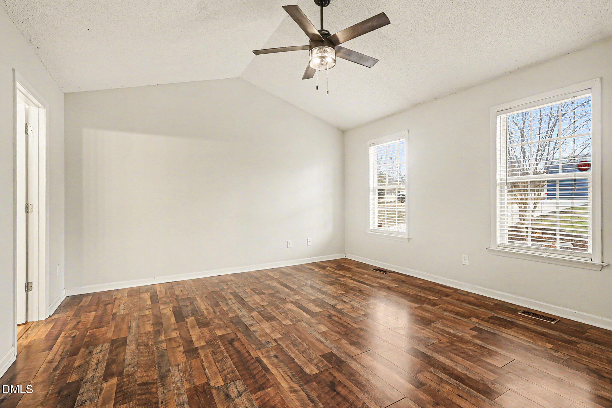 186 Turtle Point Drive Fuquay-Varina, NC 27526 - Photo 13 of 33 a view of an empty room with a window