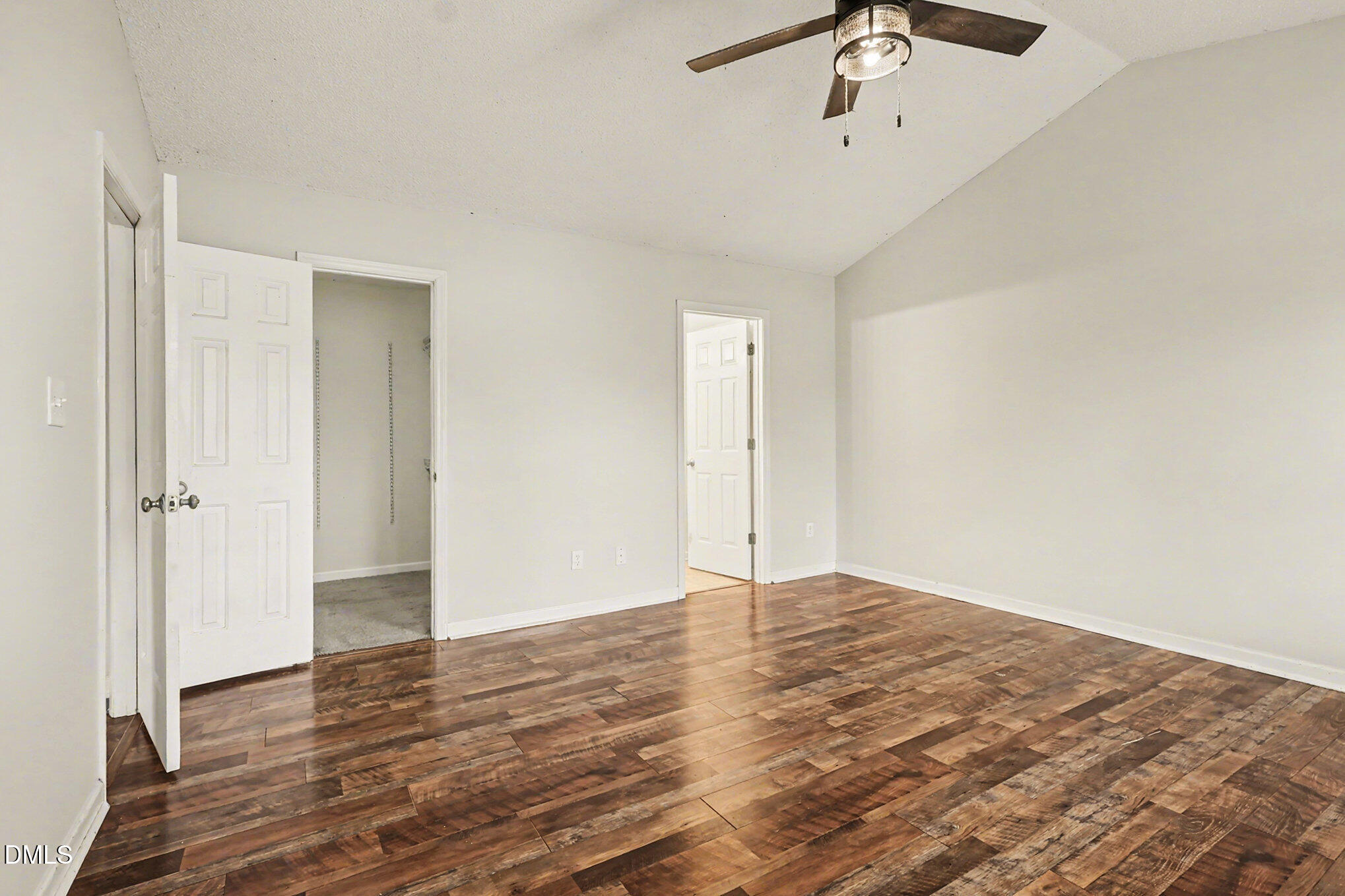 186 Turtle Point Drive Fuquay-Varina, NC 27526 - Photo 15 of 33 a view of an empty room with wooden floor