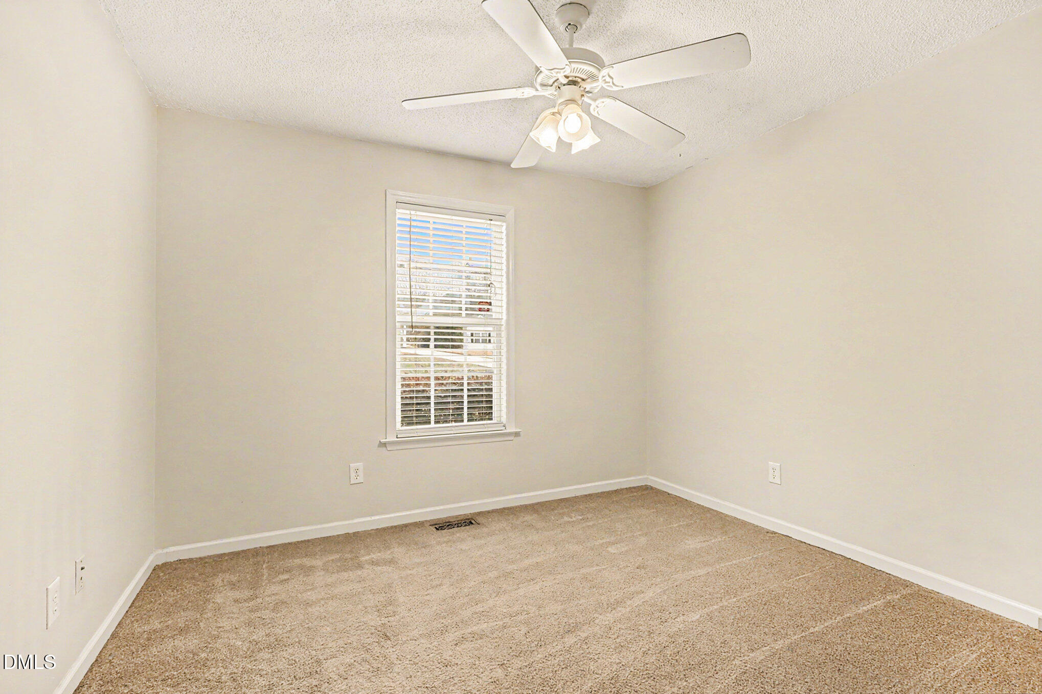 186 Turtle Point Drive Fuquay-Varina, NC 27526 - Photo 20 of 33 an empty room with a window