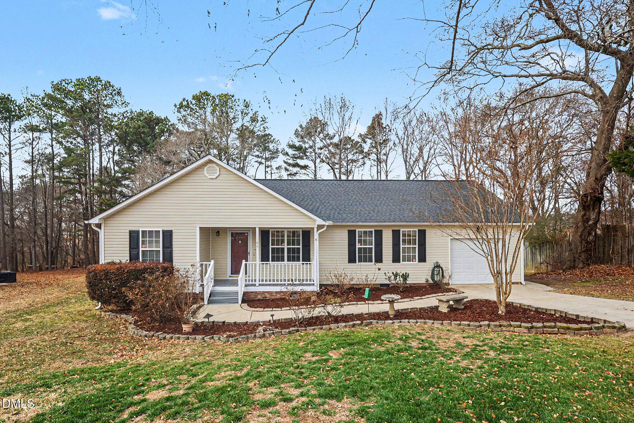 186 Turtle Point Drive Fuquay-Varina, NC 27526 - Photo 2 of 33 front view of a house with a yard