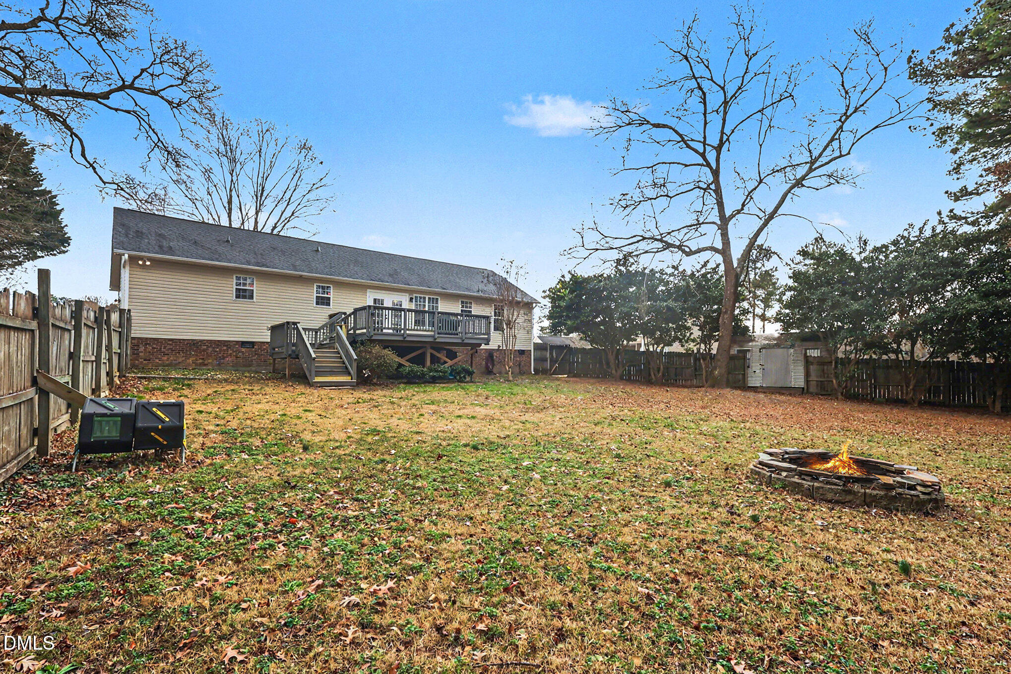 186 Turtle Point Drive Fuquay-Varina, NC 27526 - Photo 30 of 33 a view of a house with backyard and sitting area