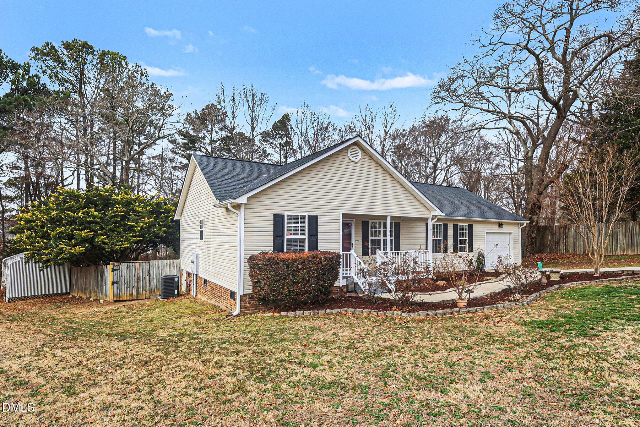 186 Turtle Point Drive Fuquay-Varina, NC 27526 - Photo 3 of 33 a view of a house with a yard and trees