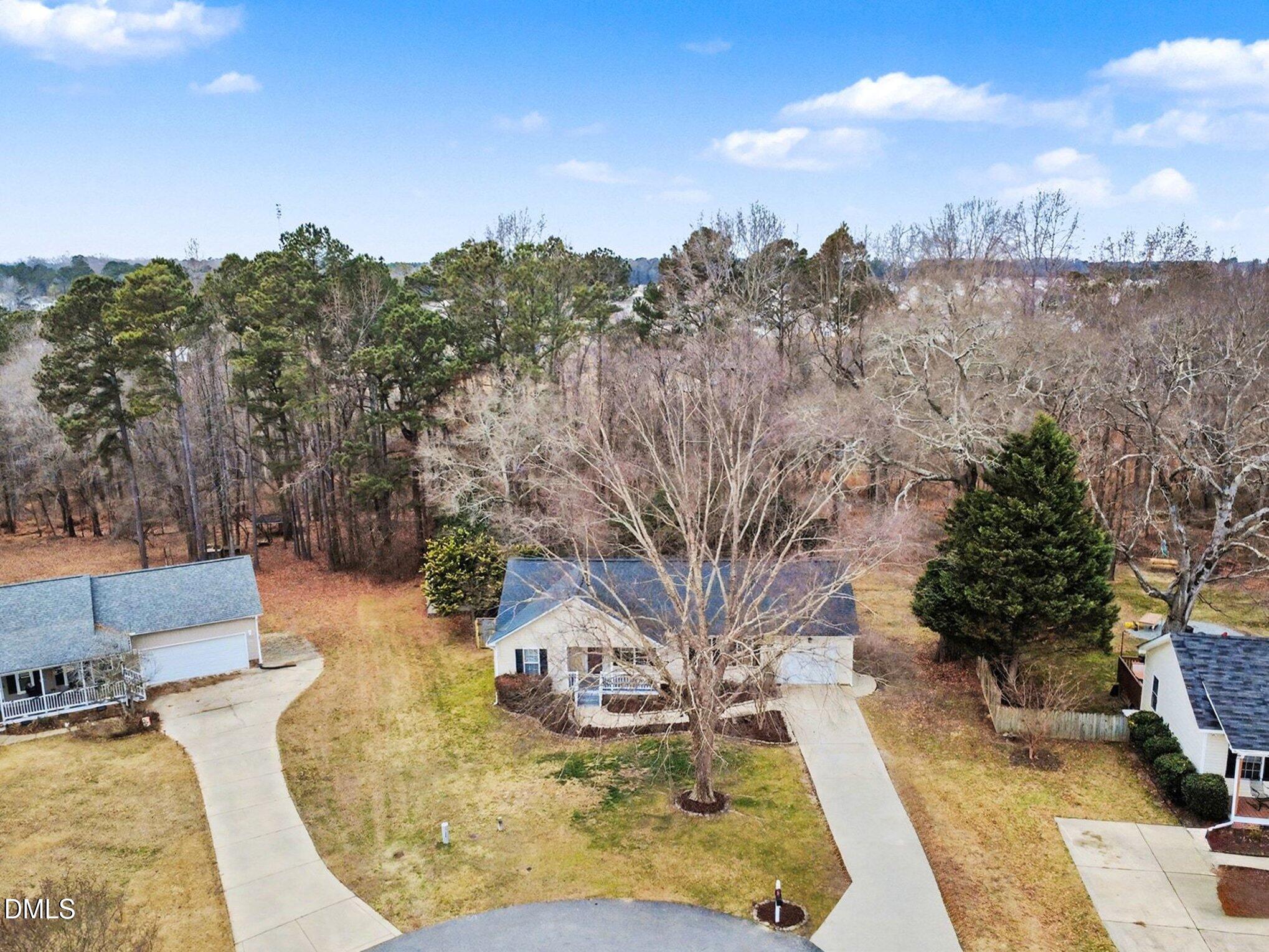 186 Turtle Point Drive Fuquay-Varina, NC 27526 - Photo 33 of 33 a view of a swimming pool with a patio and a yard