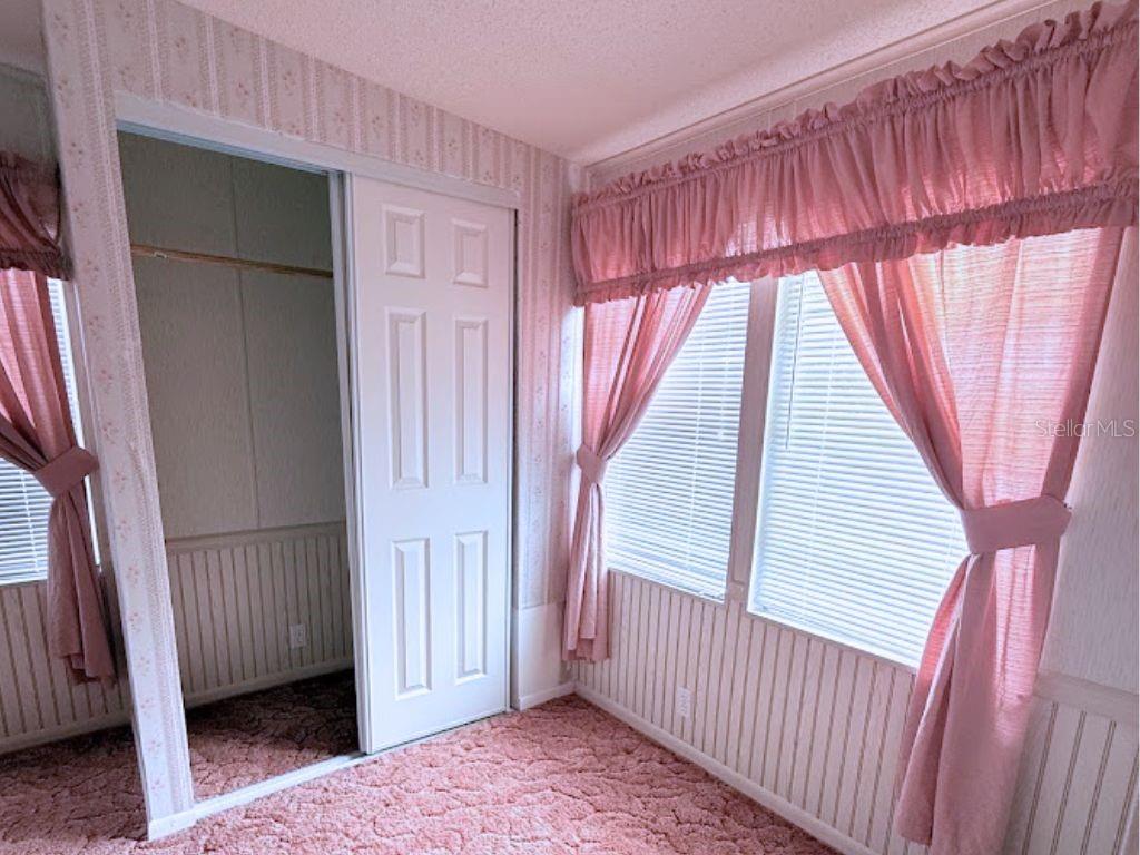 220 Ellsworth Drive Kissimmee, FL 34758 - Photo 31 of 40 a view of a livingroom with a staircase