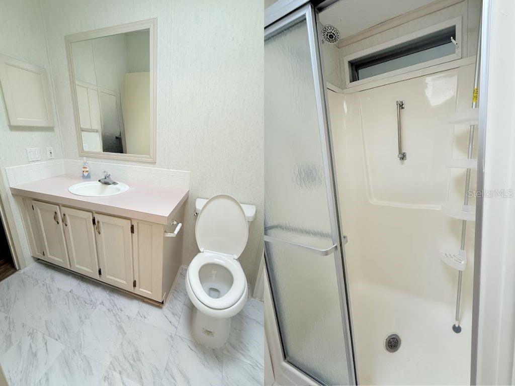 220 Ellsworth Drive Kissimmee, FL 34758 - Photo 32 of 40 a bathroom with a toilet sink and shower