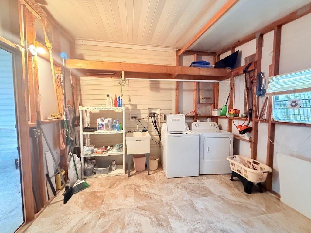 220 Ellsworth Drive Kissimmee, FL 34758 - Photo 39 of 40 a room with storage and utility