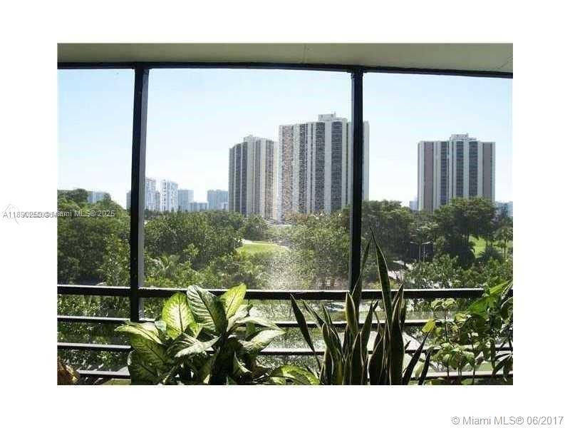 20400 West Country Club Drive, Unit 410 Aventura, FL 33180 - Photo 5 of 7 a view of swimming pool from a window