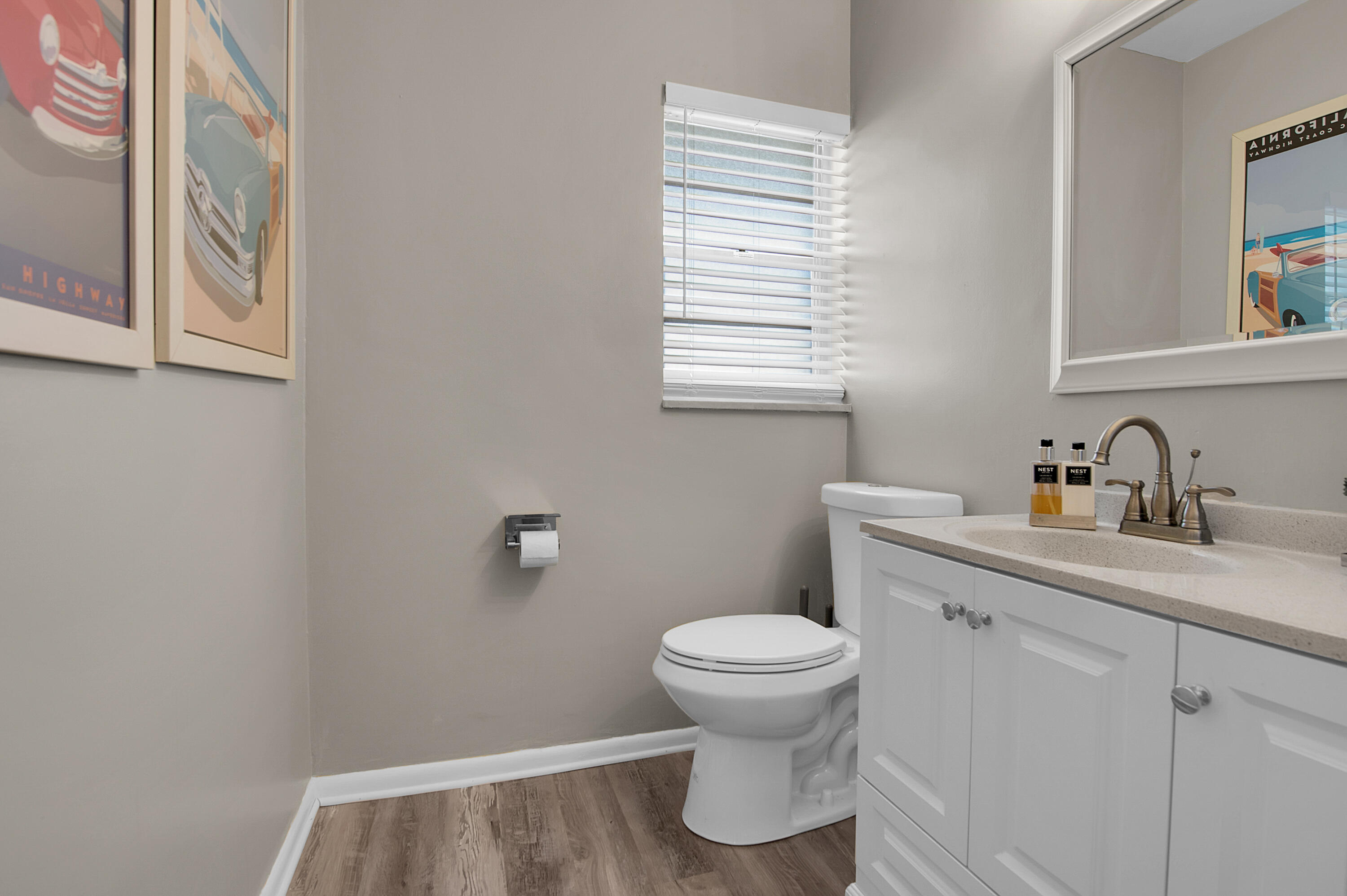 312 Northeast 17th Avenue, Unit 202 Boynton Beach, FL 33435 - Photo 15 of 44 a bathroom with a sink and a toilet