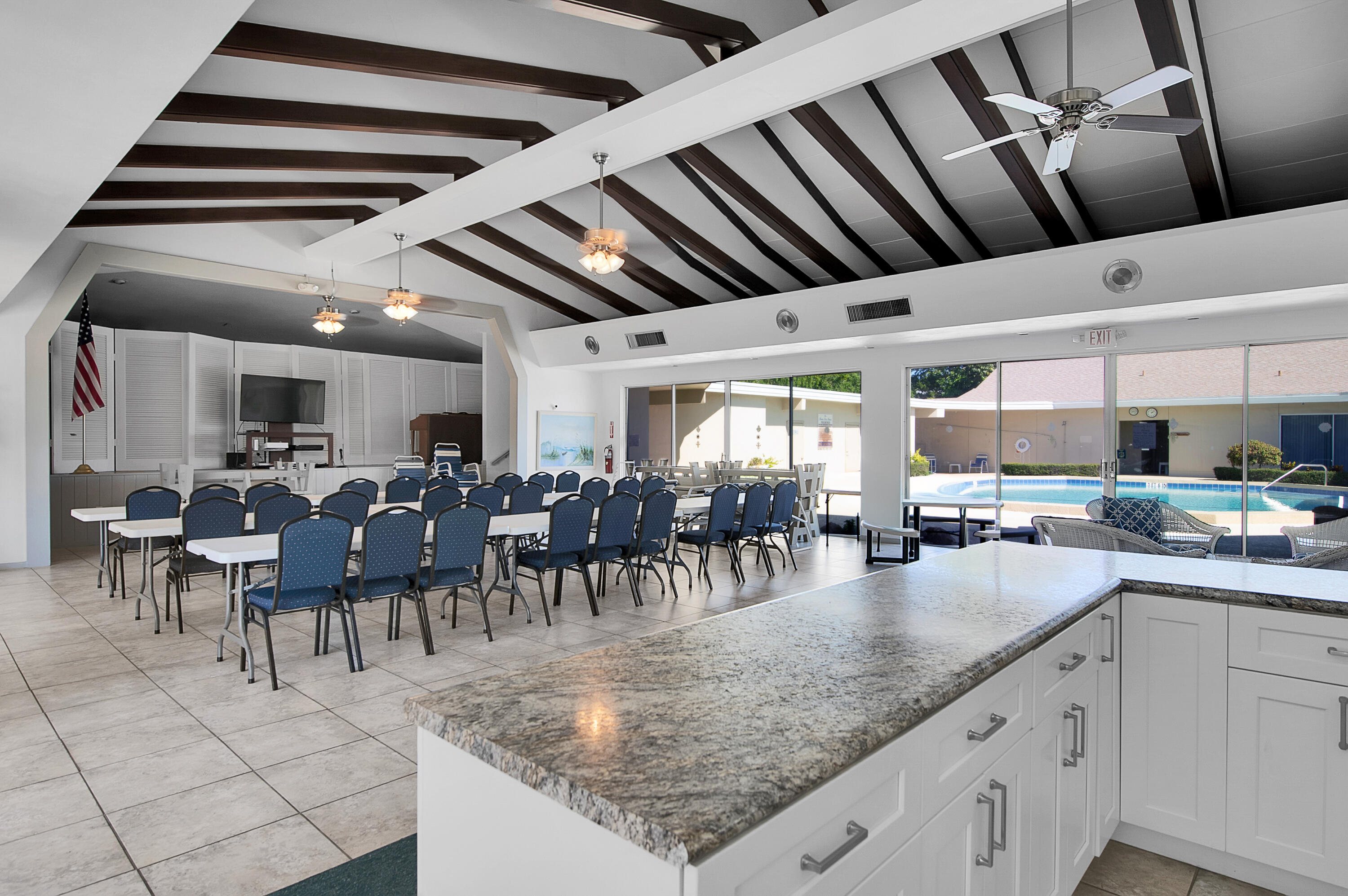 312 Northeast 17th Avenue, Unit 202 Boynton Beach, FL 33435 - Photo 32 of 44 a view of a kitchen with sink and natural light