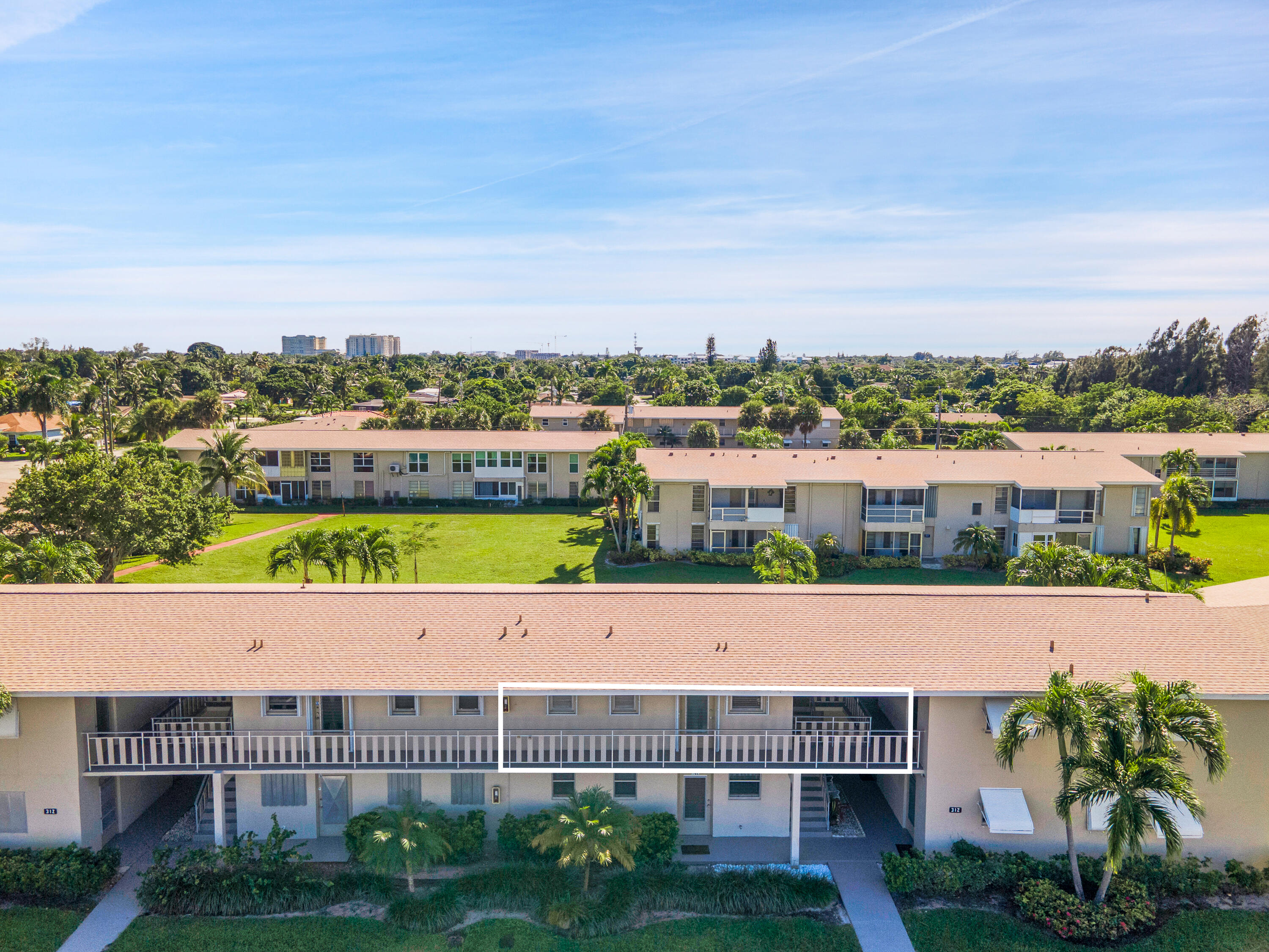 312 Northeast 17th Avenue, Unit 202 Boynton Beach, FL 33435 - Photo 38 of 44 a view of city with tall buildings