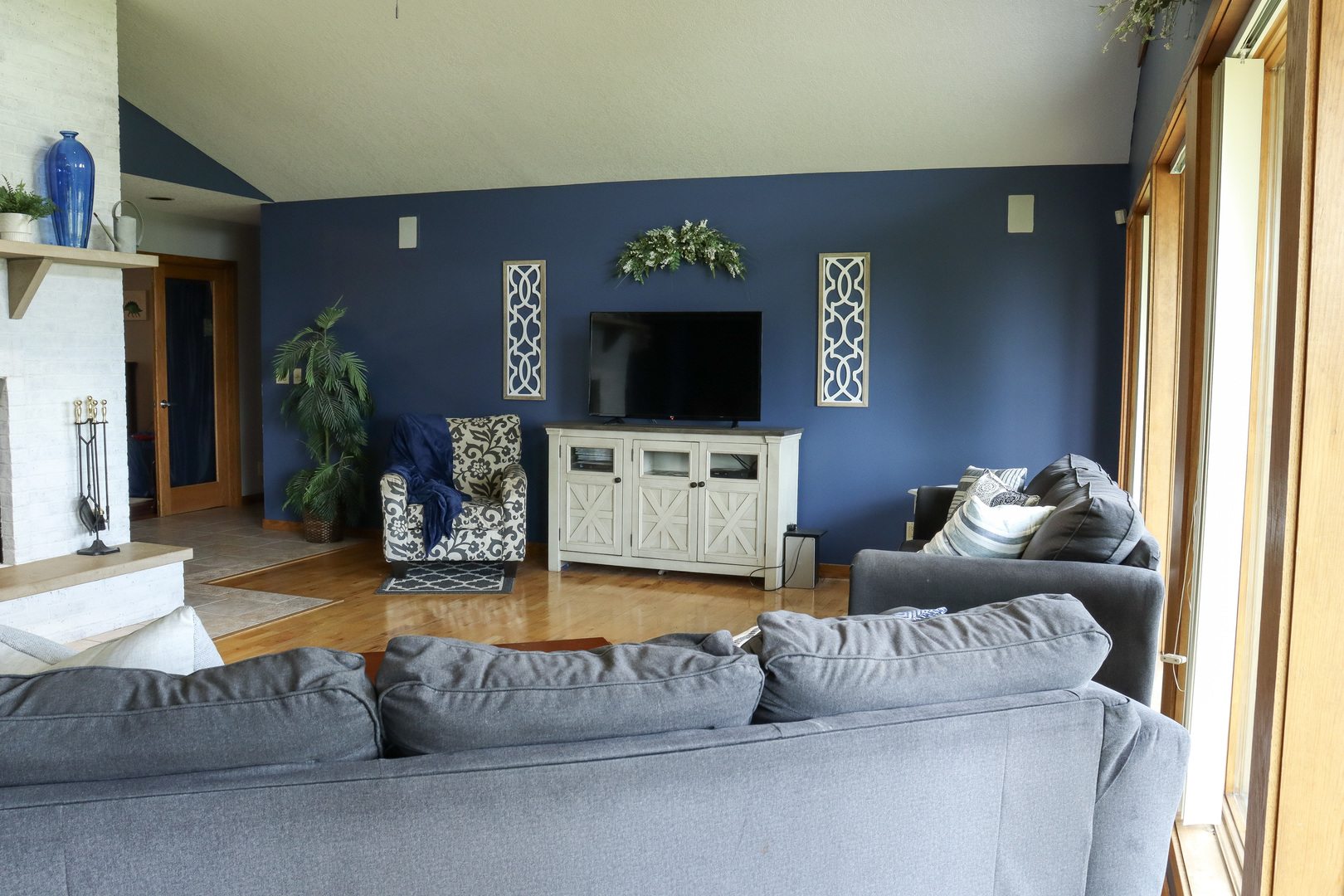 16181 Sand Road Fulton, IL 61252 - Photo 11 of 57 a living room with furniture and a flat screen tv