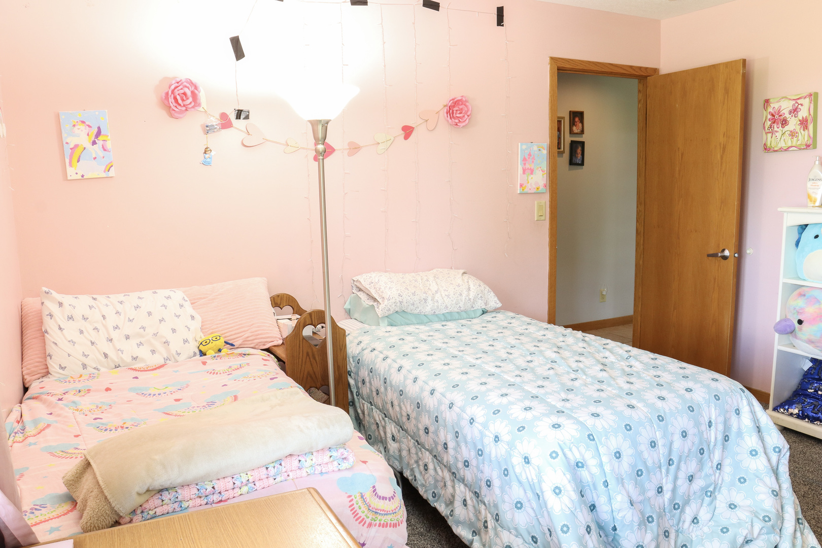 16181 Sand Road Fulton, IL 61252 - Photo 22 of 57 a bedroom with a bed and a painting on the wall