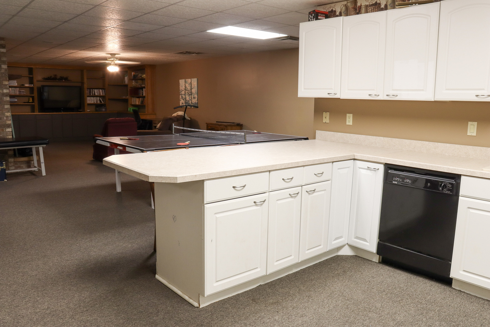 16181 Sand Road Fulton, IL 61252 - Photo 32 of 57 a kitchen with granite countertop a sink and cabinets