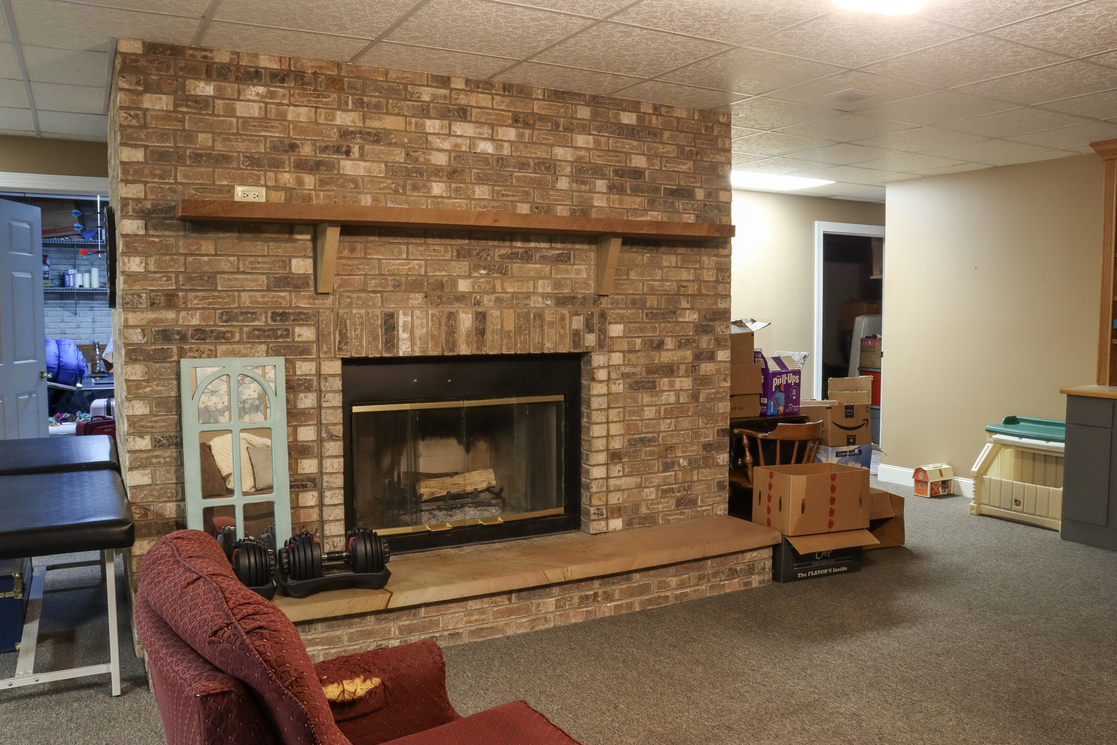 16181 Sand Road Fulton, IL 61252 - Photo 35 of 57 a living room with furniture and a fireplace