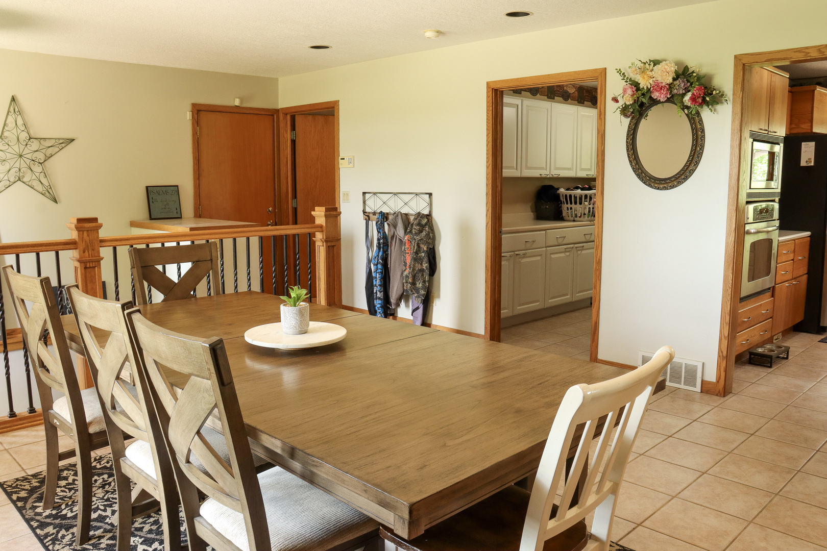 16181 Sand Road Fulton, IL 61252 - Photo 8 of 57 a dining room with furniture and a table