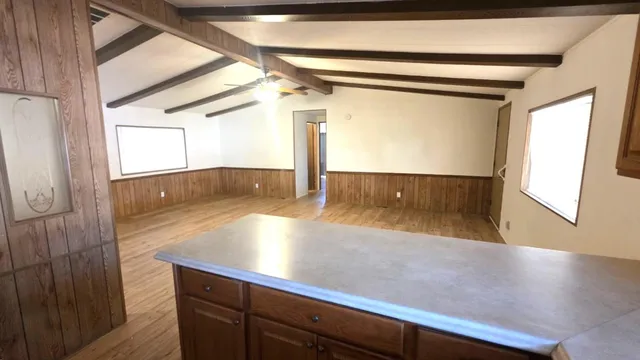 a view of kitchen and hallway