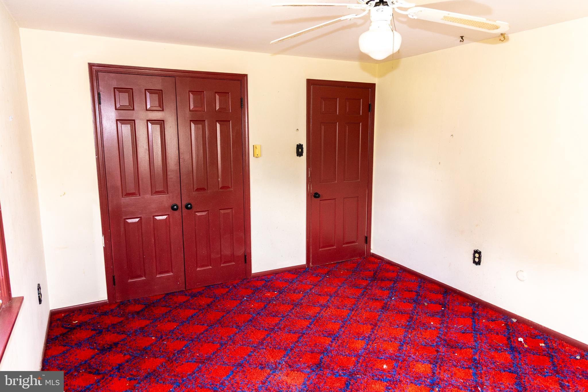 1929 Hillendale Road Chadds Ford, PA 19317 - Photo 45 of 56 a bedroom with a bed and a chandelier