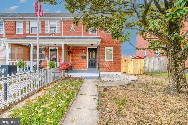 a front view of a house with a porch