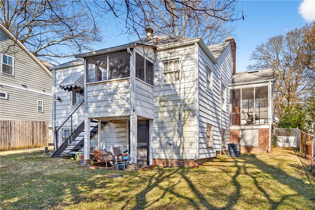 804 Berkeley Avenue Northwest Atlanta, GA 30318 - Photo 18 of 21 a view of a building with a yard
