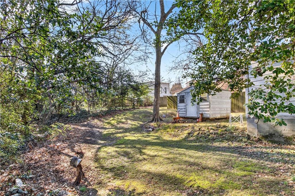 804 Berkeley Avenue Northwest Atlanta, GA 30318 - Photo 20 of 21 a view of a house with a tree