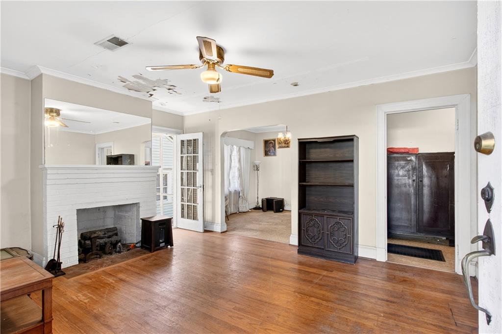 804 Berkeley Avenue Northwest Atlanta, GA 30318 - Photo 2 of 21 a view of a livingroom with furniture and a fireplace