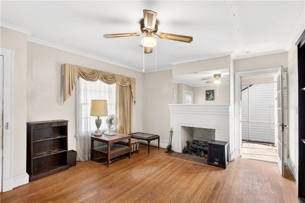 804 Berkeley Avenue Northwest Atlanta, GA 30318 - Photo 3 of 21 a living room with furniture and fireplace