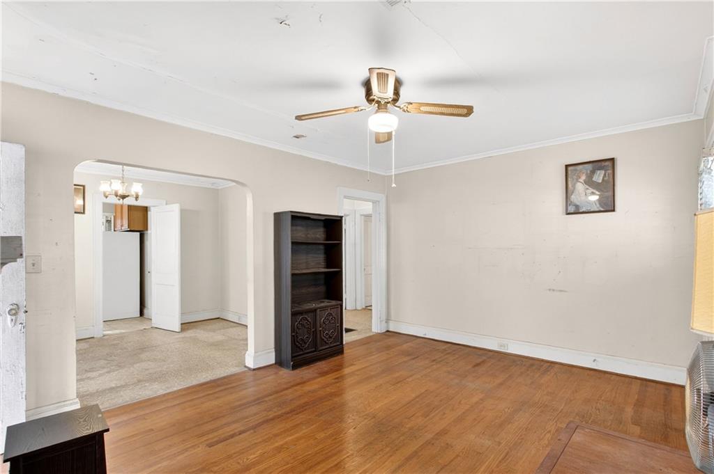 804 Berkeley Avenue Northwest Atlanta, GA 30318 - Photo 4 of 21 a view of empty room with wooden floor