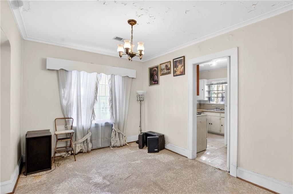 804 Berkeley Avenue Northwest Atlanta, GA 30318 - Photo 6 of 21 a view of a livingroom with a workspace