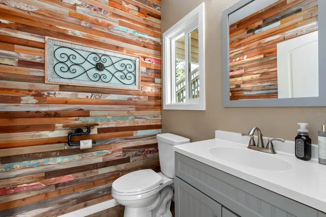 a bathroom with a toilet and a sink