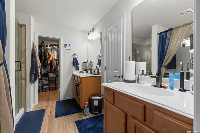 a view of living room and wooden floor
