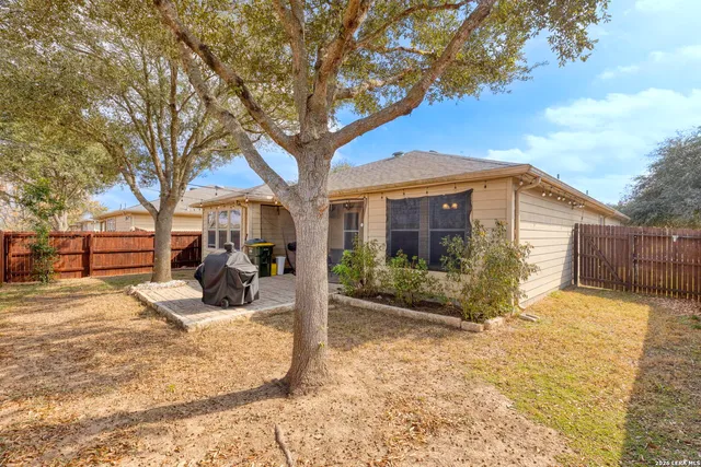 a view of a house with a snow in the yard