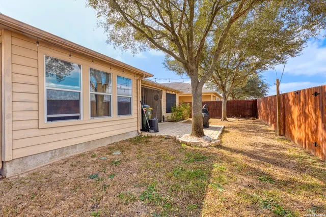 a house with trees in the background