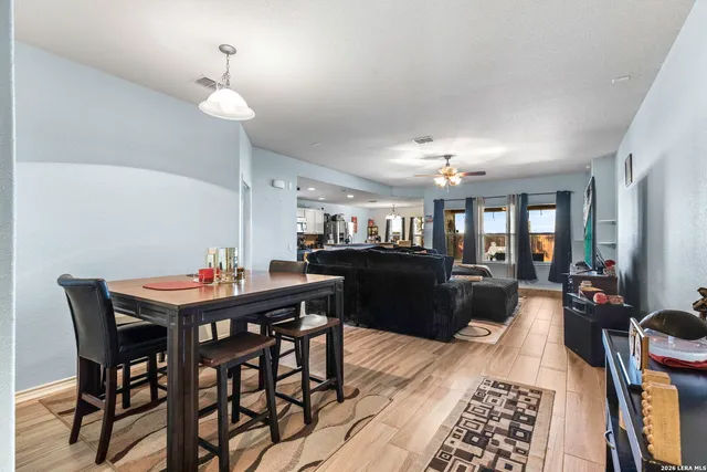 a view of a dining room with furniture