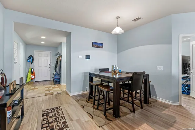a view of a dining room with furniture