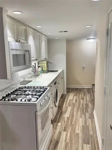 a bathroom with a toilet and a sink