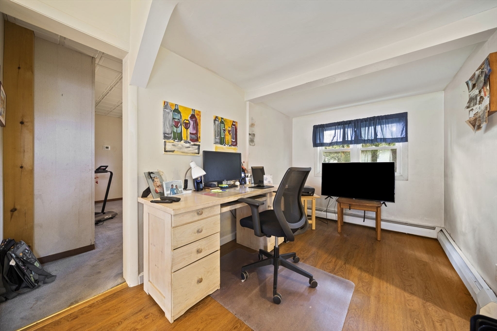 619 North Main Street Mansfield, MA 02048 - Photo 7 of 28 a view of a workspace with furniture and a window