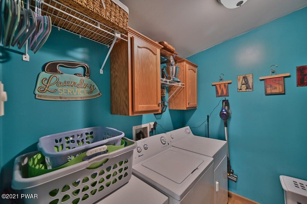 417 Northgate Road Lake Ariel, PA 18436 - Photo 47 of 91 a utility room with a refrigerator a washer and dryer