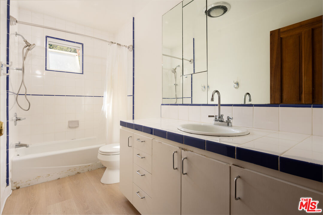 200 Mabery Road Santa Monica, CA 90402 - Photo 8 of 18 a bathroom with a sink a toilet and shower