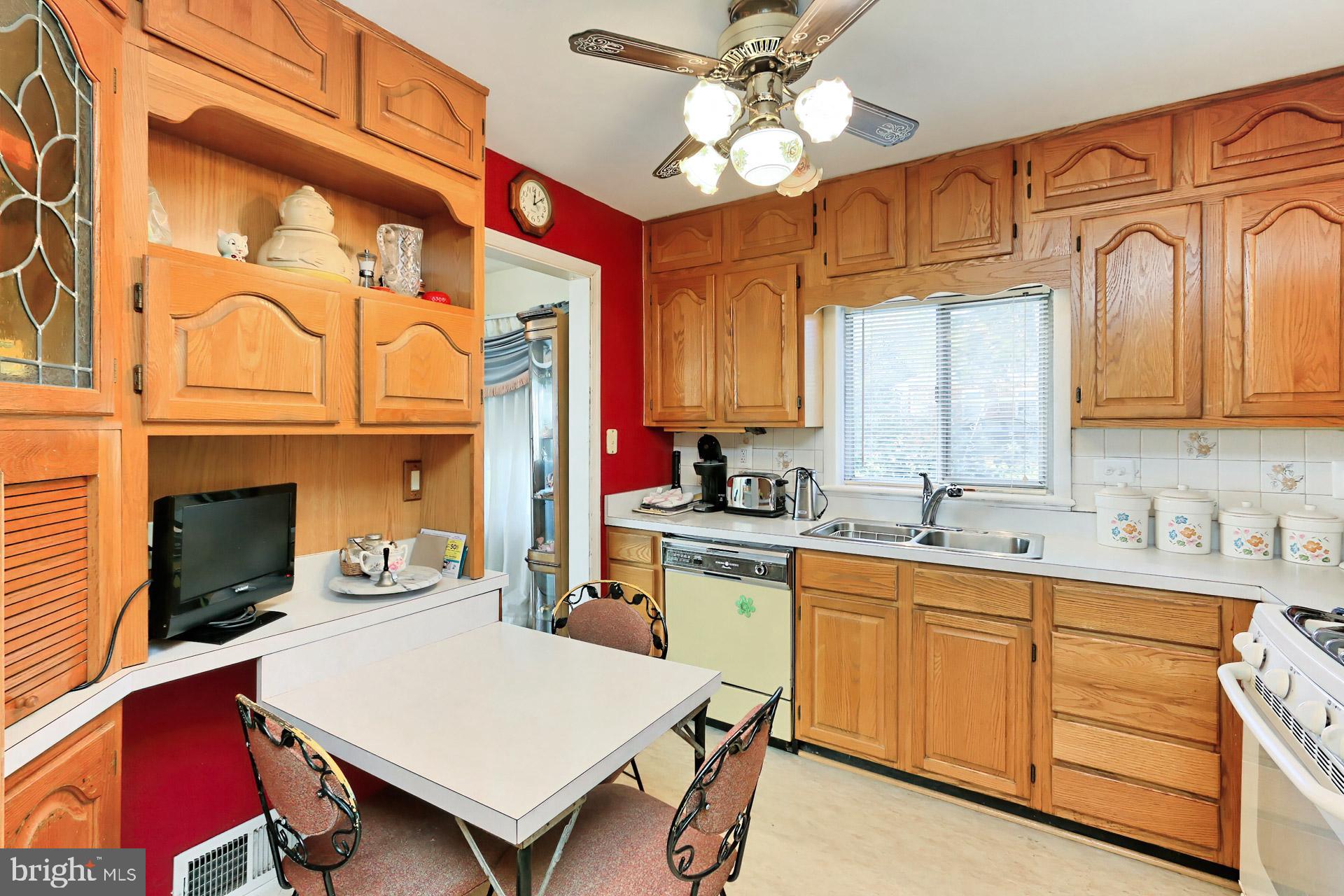 1806 Shenandoah Road Alexandria, VA 22308 - Photo 13 of 33 a kitchen with cabinets a sink and appliances