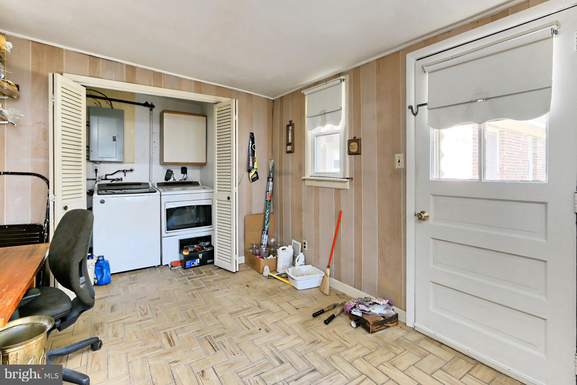 1806 Shenandoah Road Alexandria, VA 22308 - Photo 18 of 33 a view of a workspace with furniture and a window