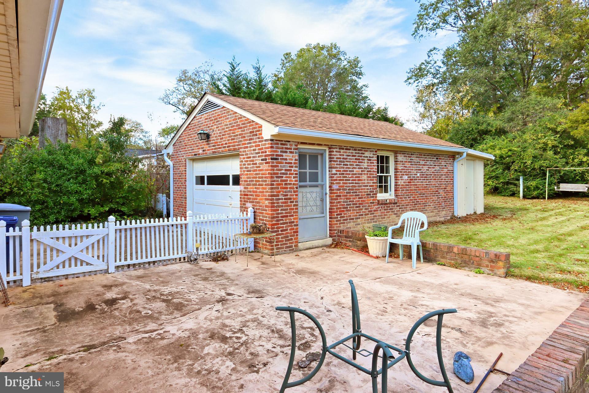 1806 Shenandoah Road Alexandria, VA 22308 - Photo 26 of 33 a view of a house with backyard and a tree