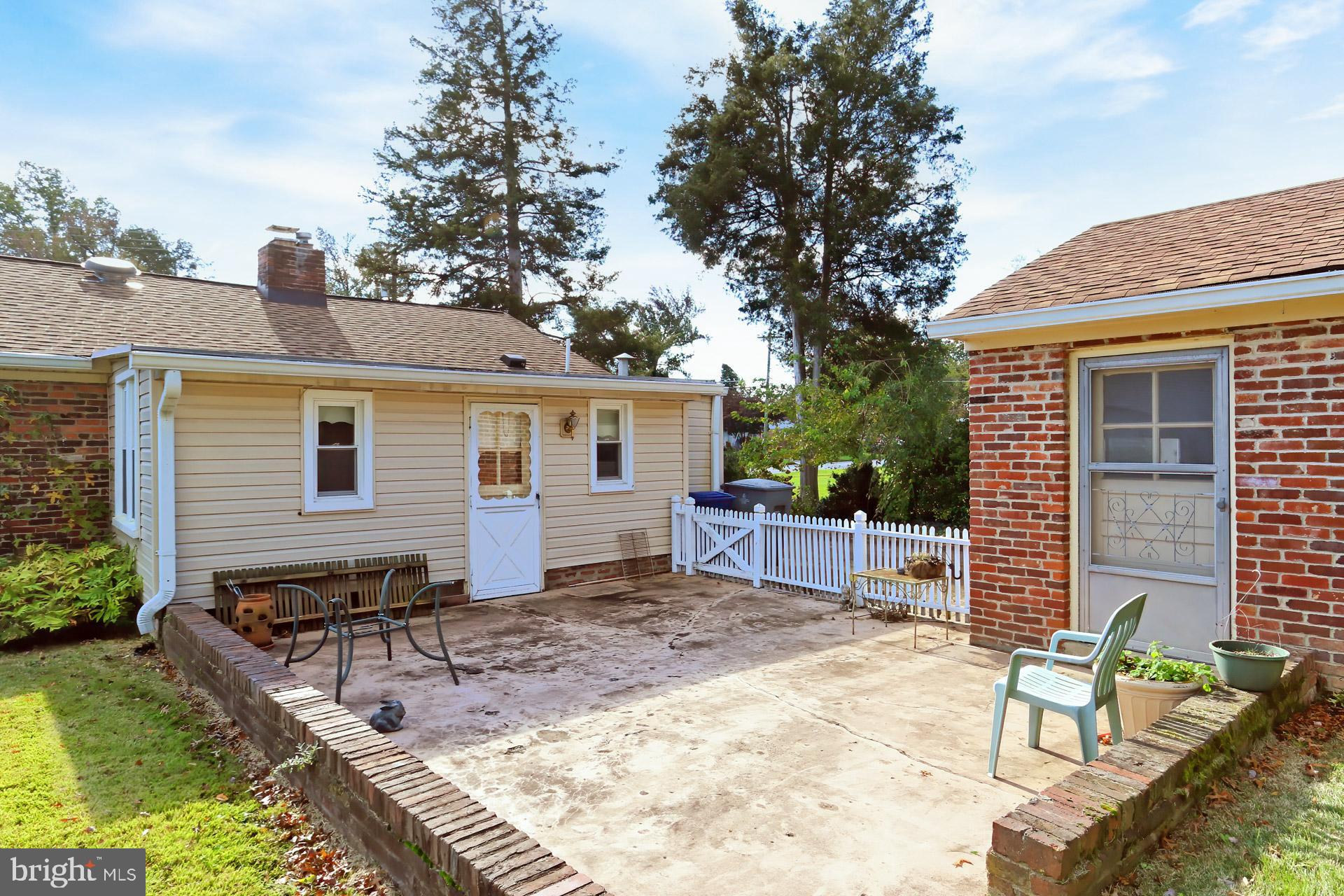 1806 Shenandoah Road Alexandria, VA 22308 - Photo 27 of 33 a view of a house with backyard and sitting area
